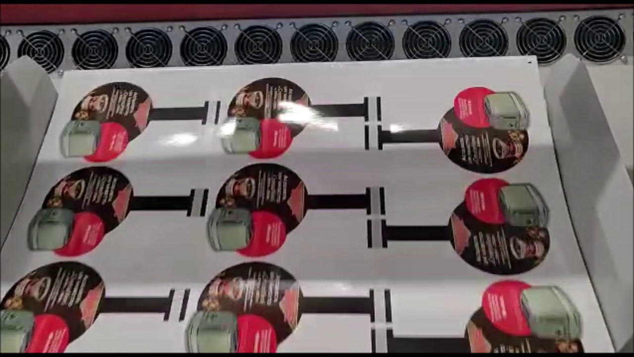 Applying tape to shelf wobblers / talkers