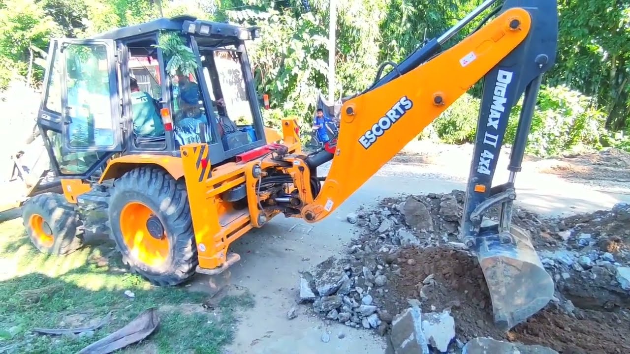 Escorts 4x4 JCB going to Road construction work for PWD road