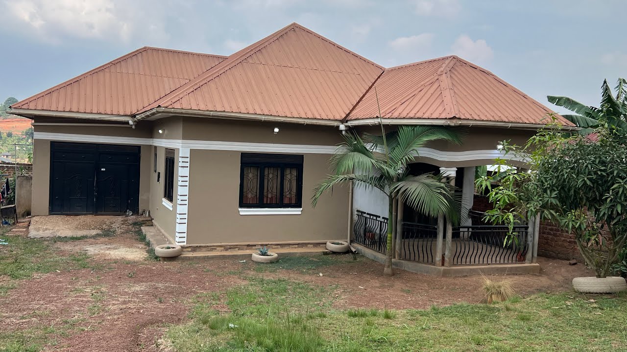 RESIDENTIAL HOUSE WITH EIGHT SINGLE ROOMS RENTALS ON SALE WITH LAND TITLE IN NKOOWE WAKISO 