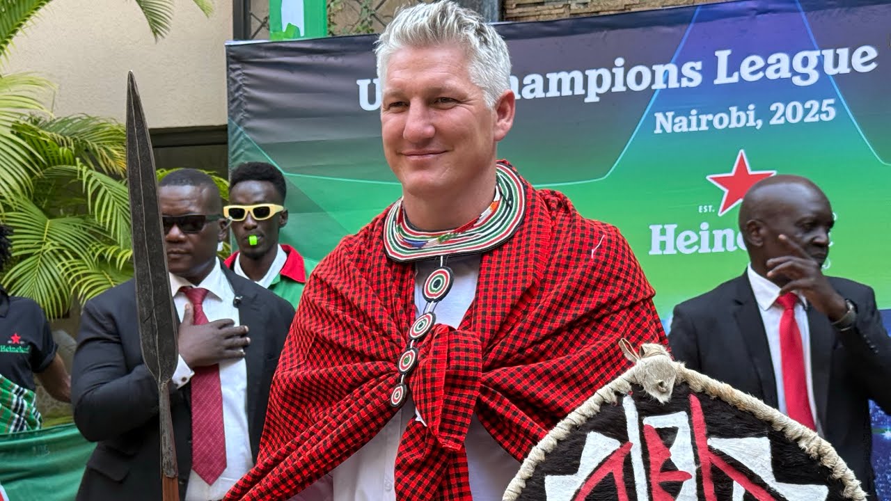 Bastian Schweinsteiger receives a hero’s welcome in full Maasai regalia on arrival  in kenya