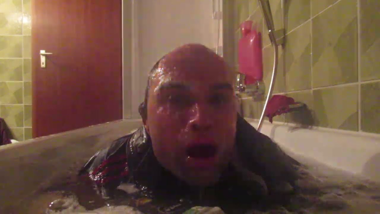 Me taking a fully clothed bath again (jeans and winter jacket)