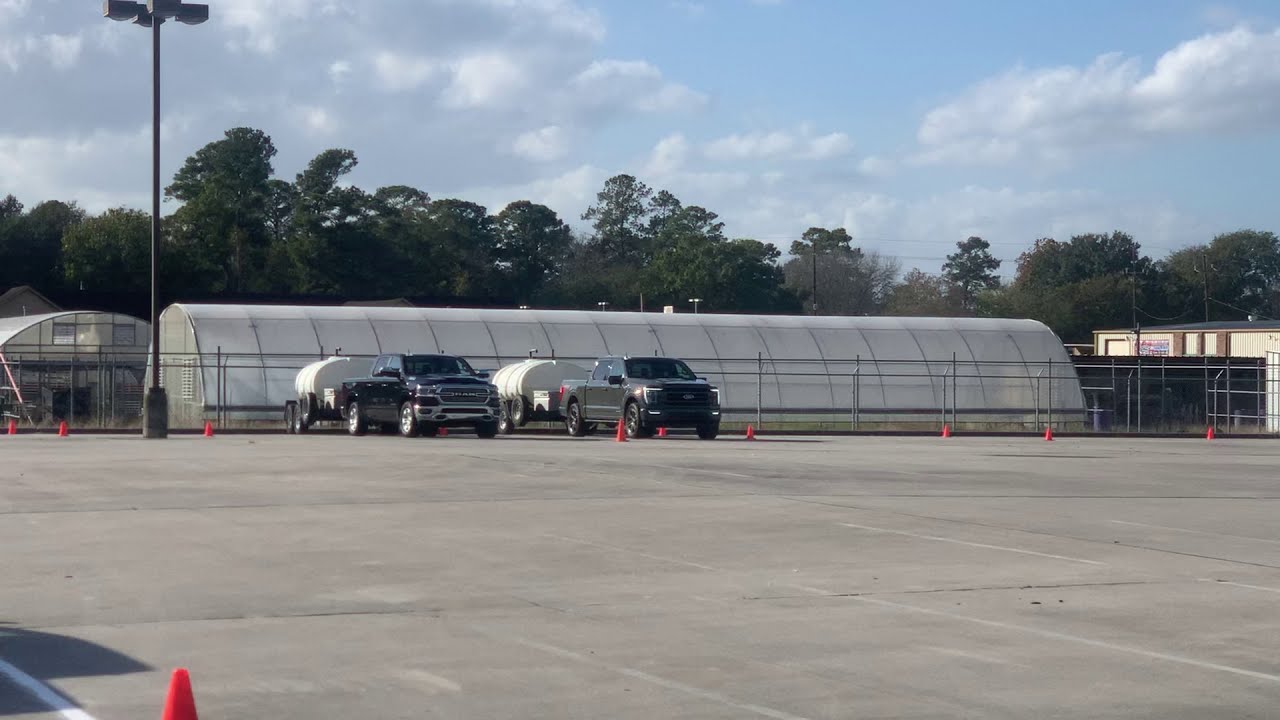 2021 F150 3.5 Powerboost Hybrid vs 2021 Ram 5.7 Hemi Hybrid Drag Race