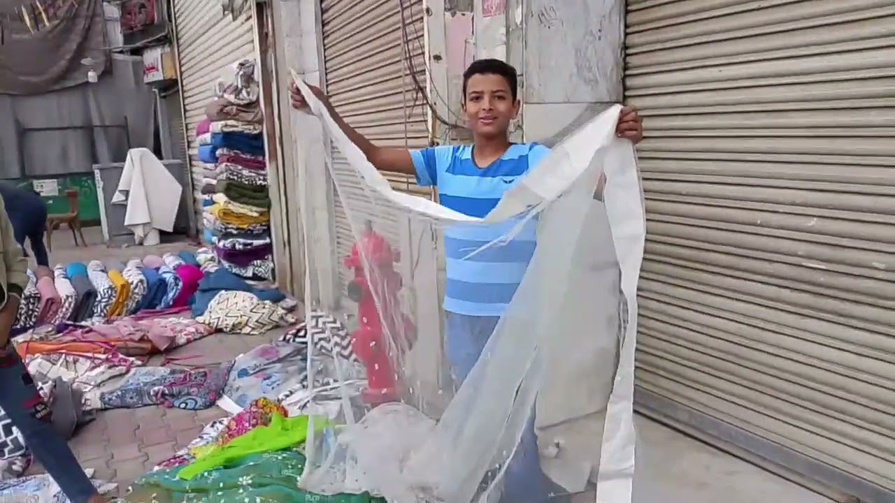 سوق الاحد فى وكاله البلح ناحيه الكورنيش عند البنك الاهلى دنيا تانيه لبس وفروشات كتير