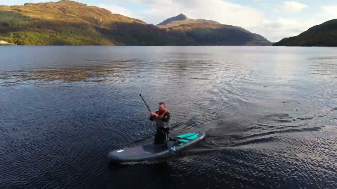 Mark The Humanist on a paddle board, Loch Lomond, Scotland