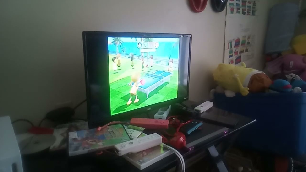 TRYING TO BEAT LUCIA IN WII SPORTS RESORT TABLE TENNIS!!!