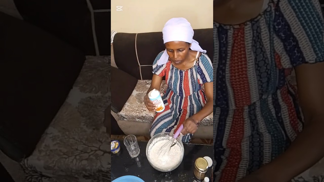 Embracing the Art of the Village Baking (No Oven, No Mixer) Baking a Groundnuts Cake 🍰🎂 on a Jiko.