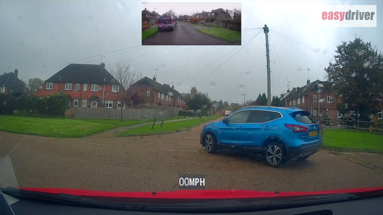 Sit in on a REAL driving test in the RAIN...