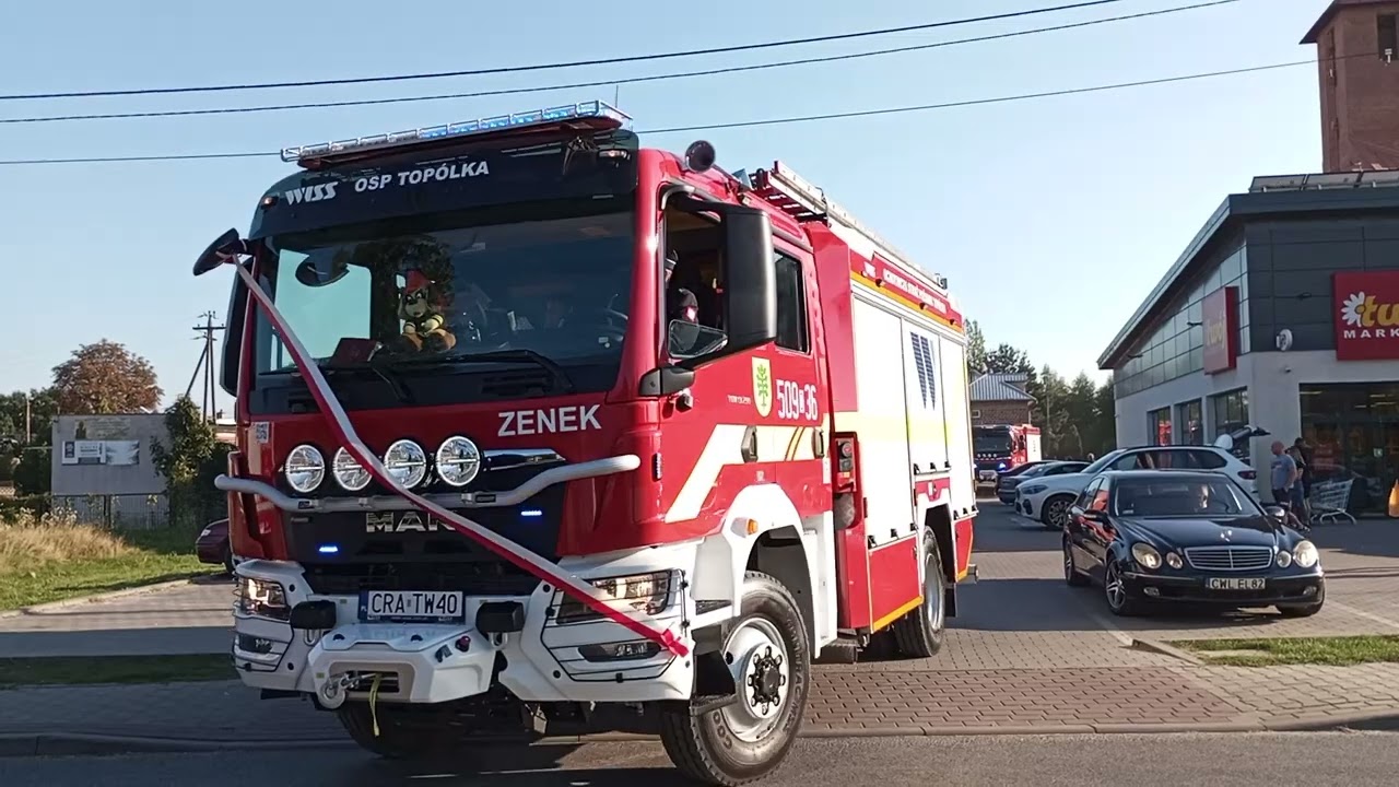 Przejazd i przemarsz kolumny Jednostek OSP z terenu gminy Topólka
