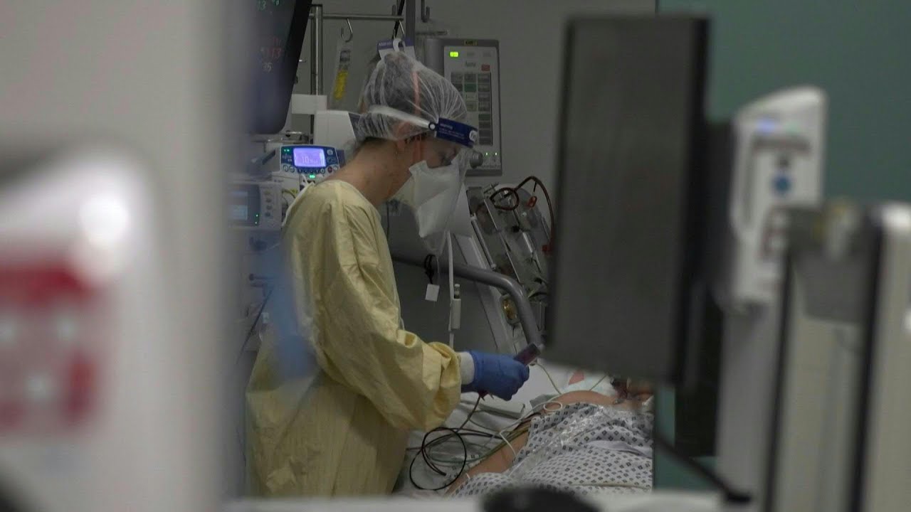 Inside a busy intensive care unit in London as virus cases surge across UK | AFP