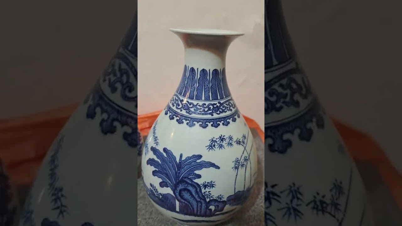 清代乾隆青花蕉竹山石圖[永宣筆法]玉壶春瓶（大清乾隆年製）款。澳門沐瓷樓