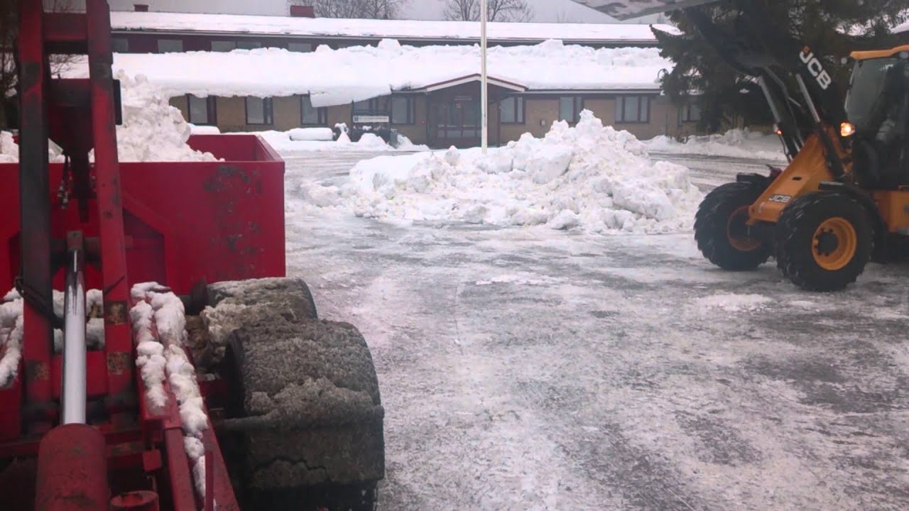Jcb 409 lastar snö