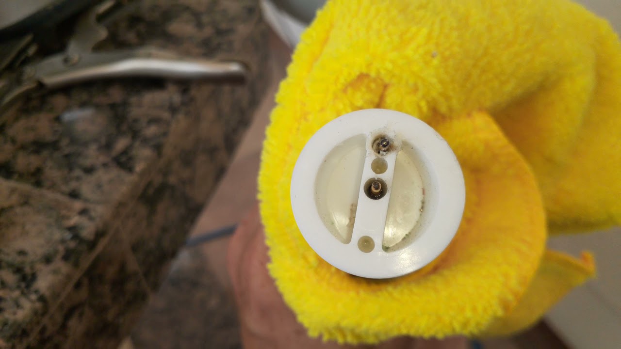 dolphin CC Plus pool cleaner stopped working fix.  pin inside of White swivel cord connection