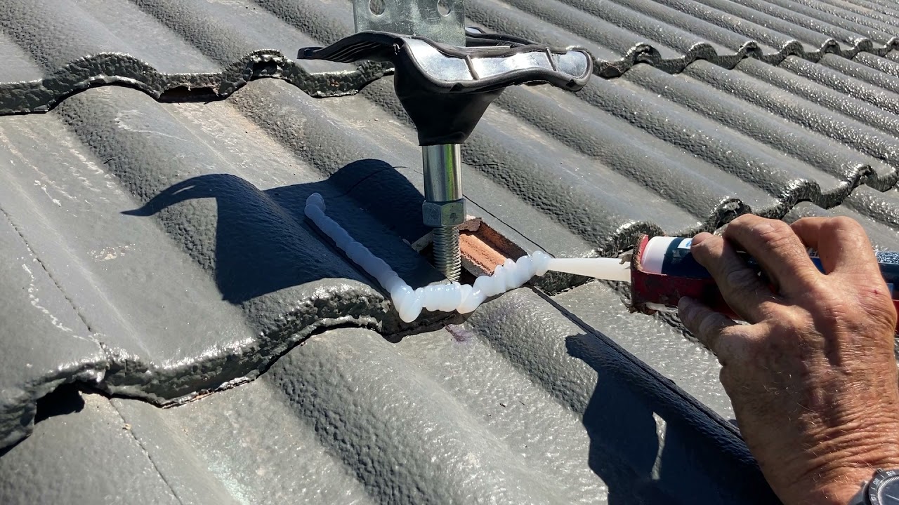 How to cut roof tiles and flash a extend bracket