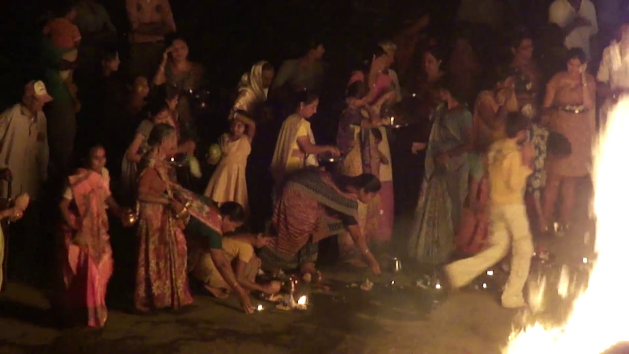 Holika Dahan: A traditional Ancient Holi Pooja fire ritual - Rural Village, Navsari, Gujarat, India.