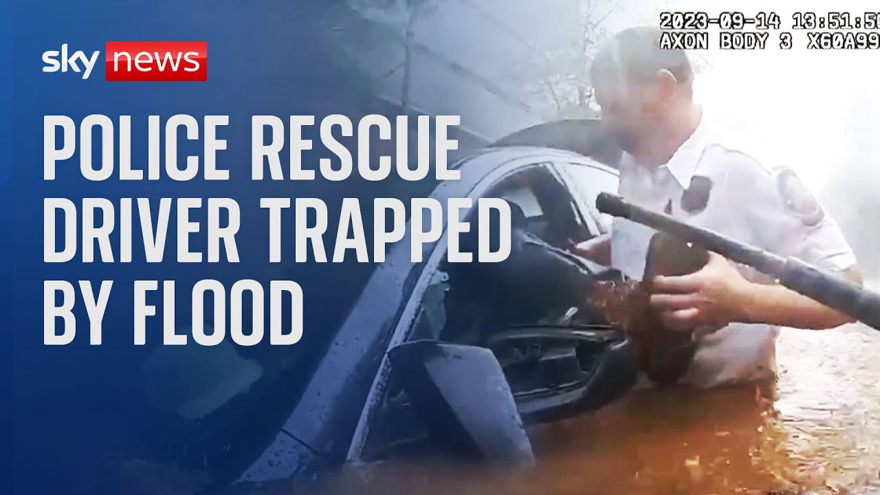 Atlanta: Police officers rescue driver trapped by flood