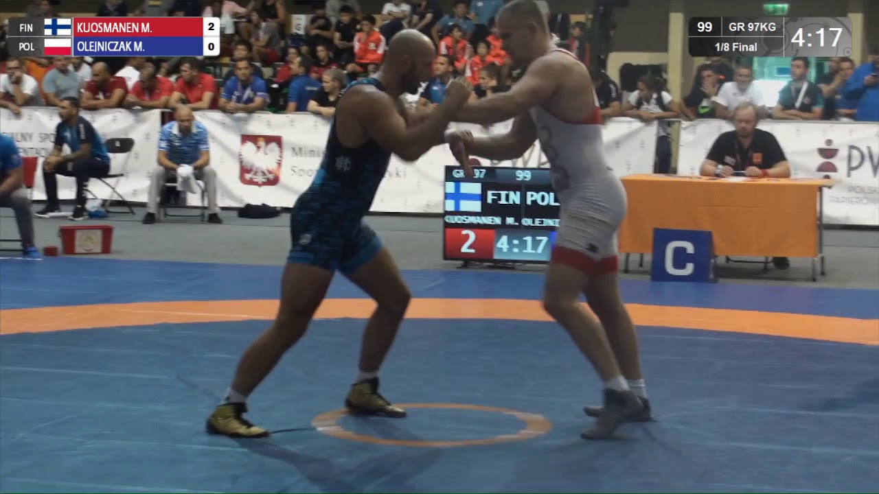1/8 GR - 97 kg: M. KUOSMANEN (FIN) v. M. OLEJNICZAK (POL)
