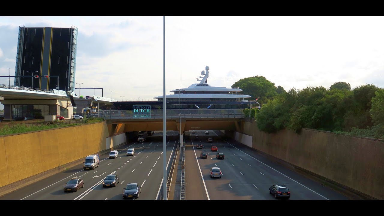 Feadship Lonian taking the Gouwe Aquaduct to pass the highway