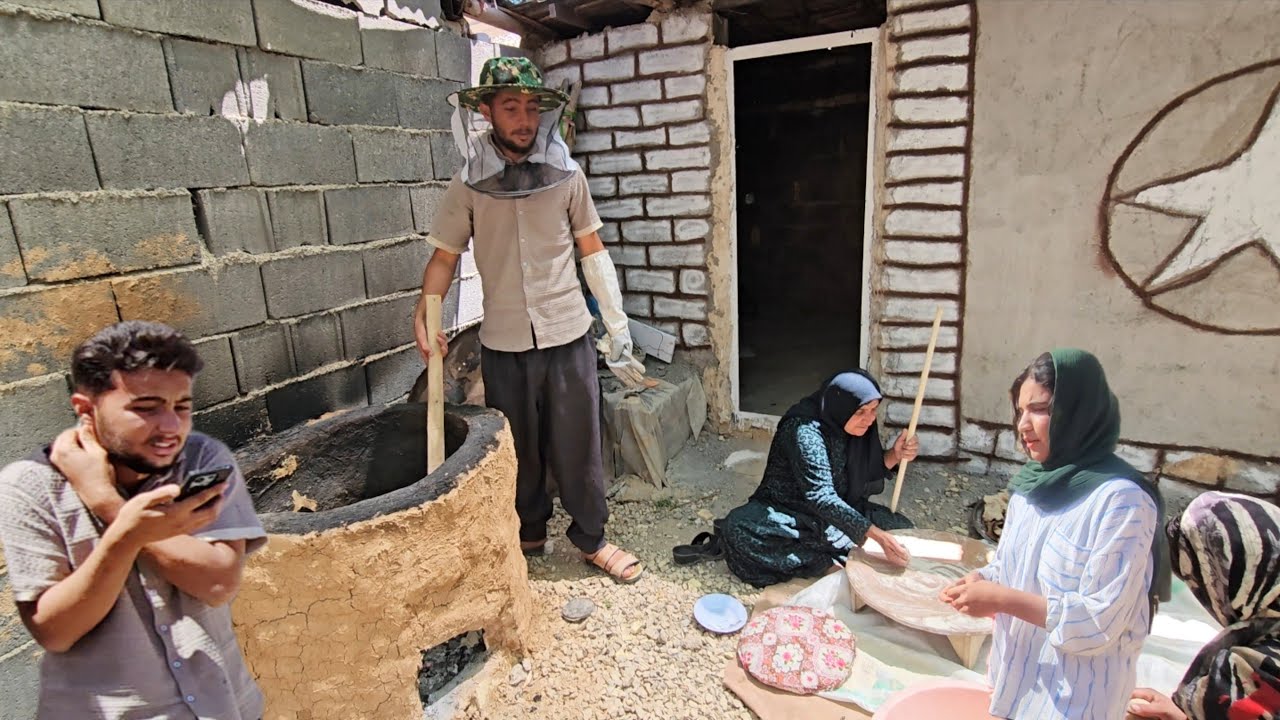 Ali's help to his neighbor! And the first bread is baked in a local oven!