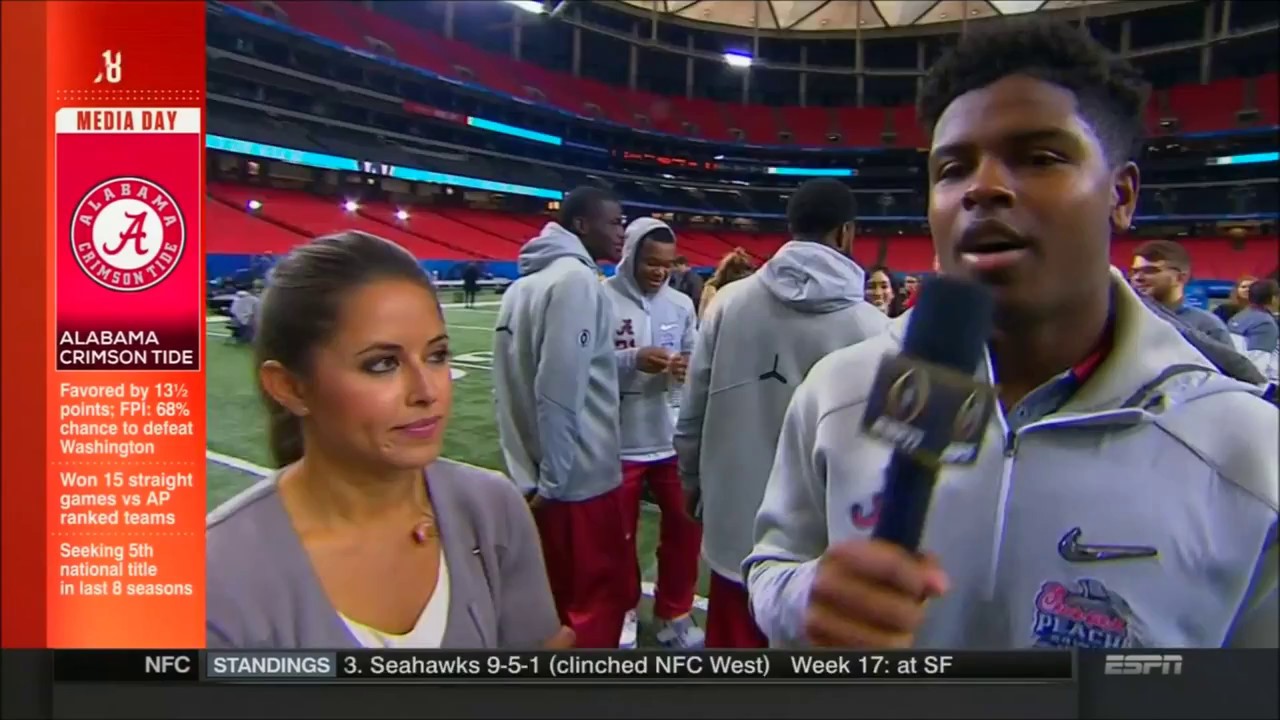 Alabama receiver Josh Pugh interviews ESPN's Kaylee Hartung at Peach Bowl Media Day