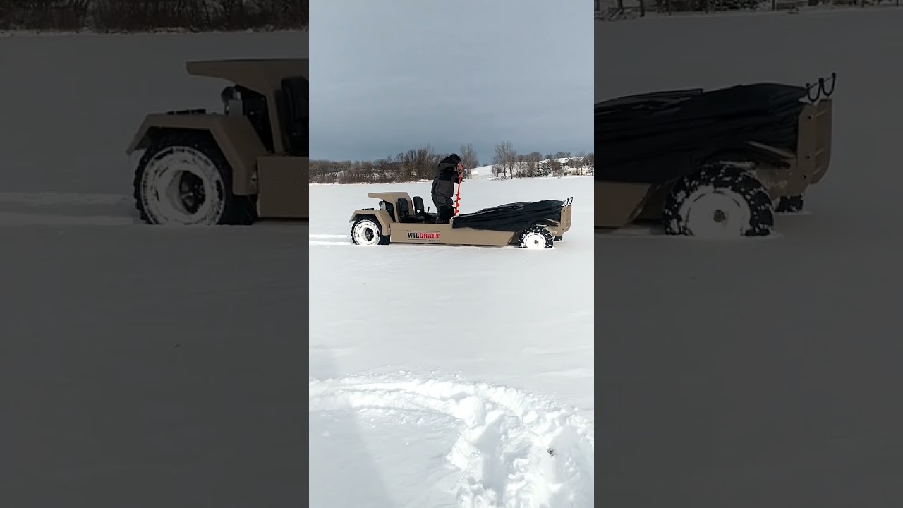 In the snow on the ice in a Wilcraft Ice fishing