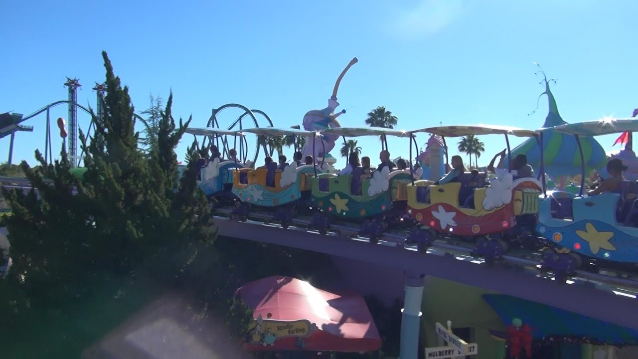 Fly high in the sky on the Seuss Trolley Train Ride at Islands of Adventure