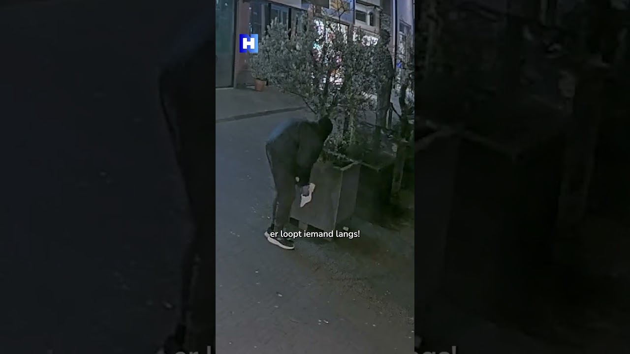 Knullige inbreker verstopt zich achter plantenbak