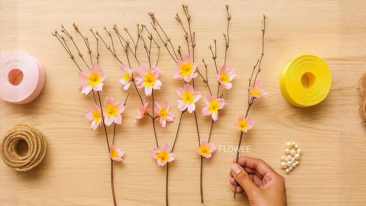 You Won't Believe This Cherry Blossom Tree Is Made from Satin Ribbon and Real Branches! 🌸