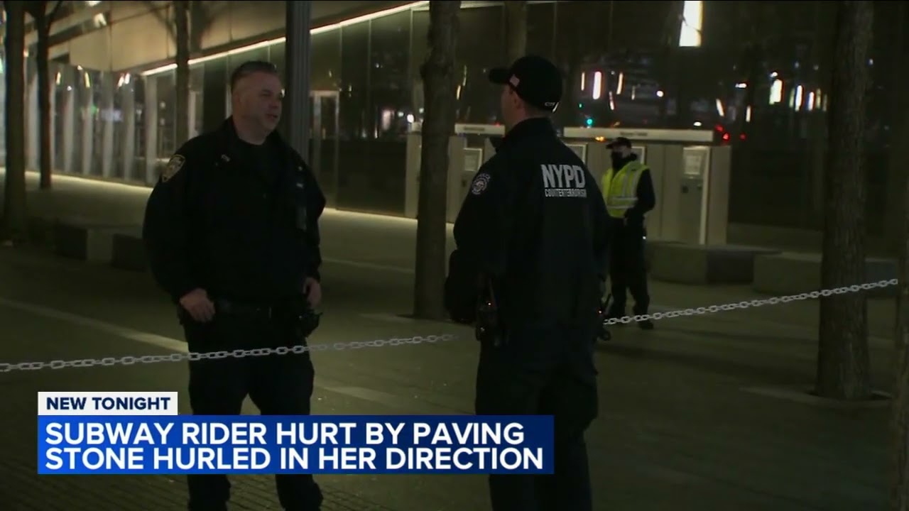 Woman injured after rider on Manhattan subway train throws paving stone