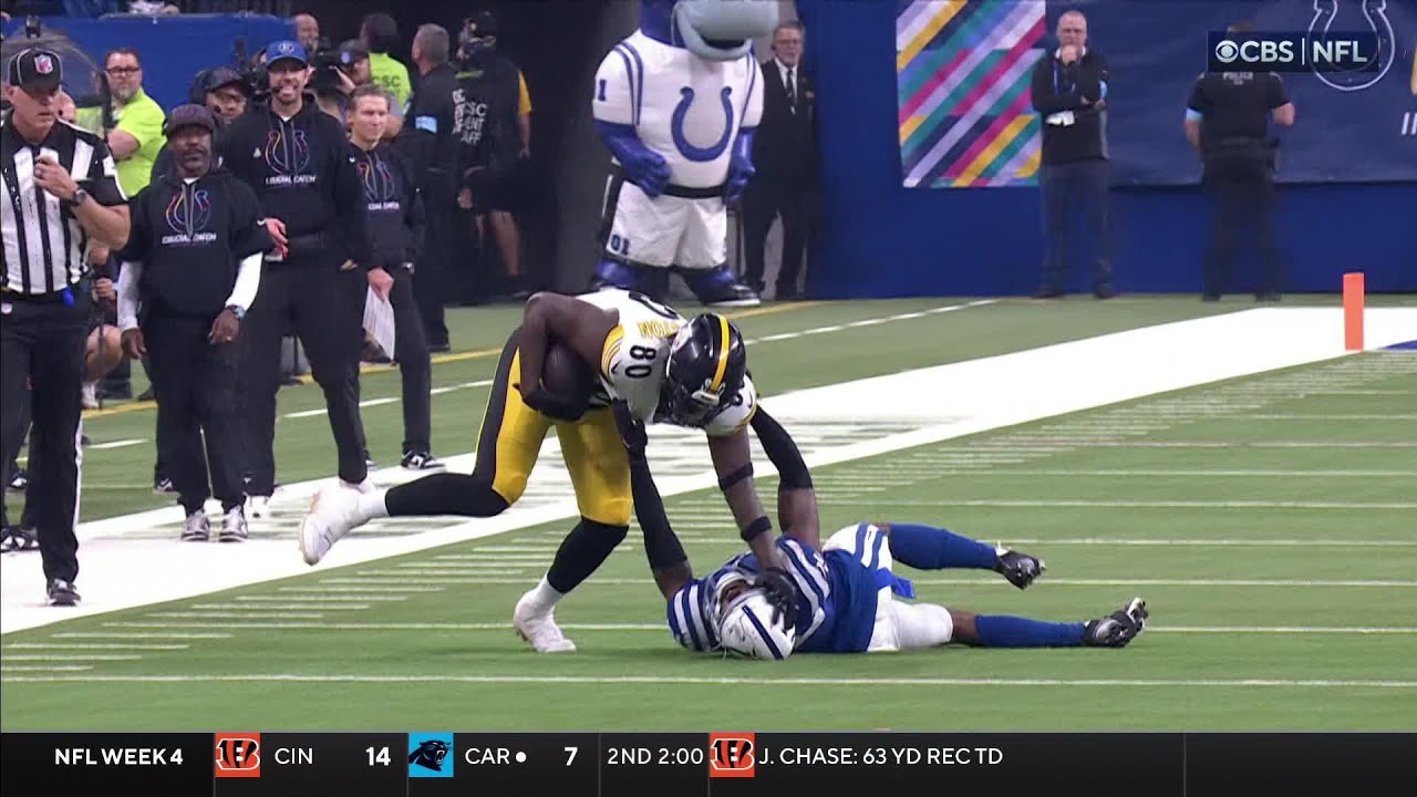 Stiff-arm and hurdle in same play! Darnell Washington does it all vs. Colts