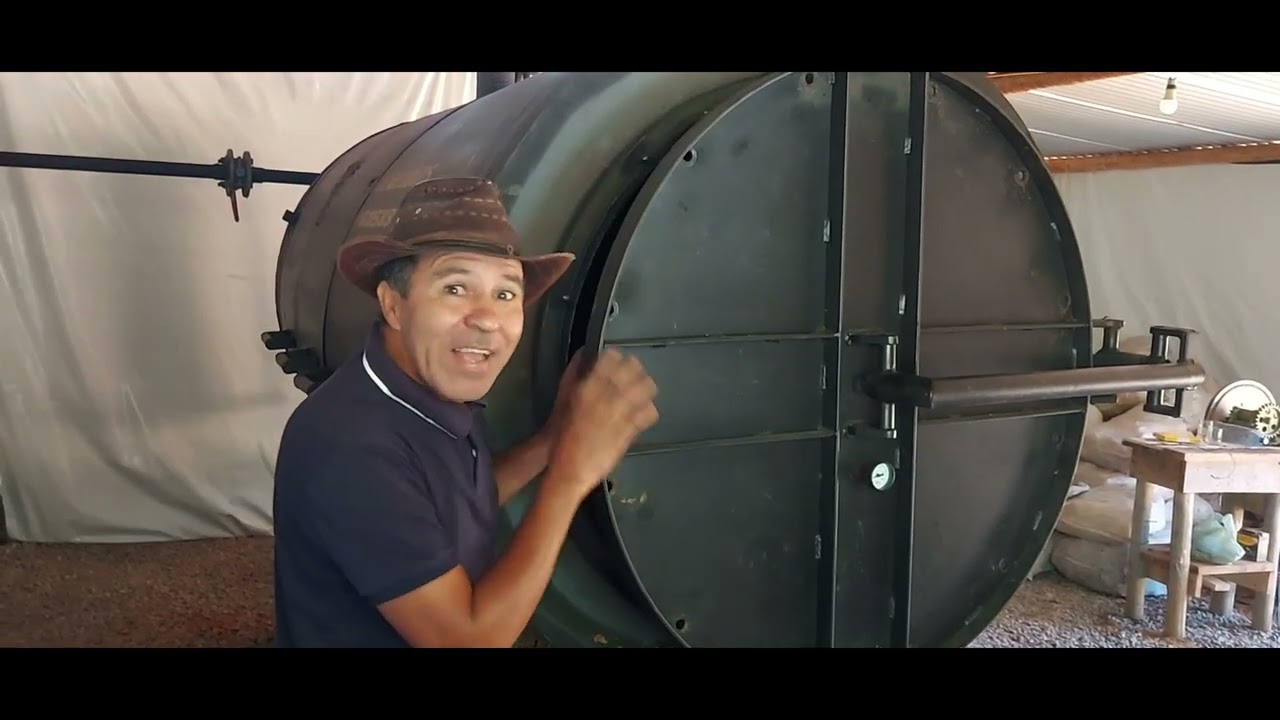 ABRINDO A PORTA DO REATOR 2° RODADA CARBONIZAÇÃO DE CASCA DE COCO VÍDEO 4