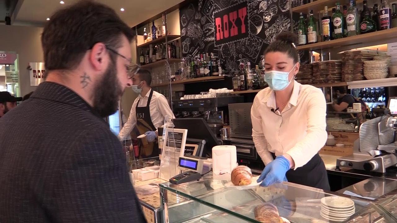Lunghe file, mascherine obbligatorie e termoscanner: ecco come Bologna riparte