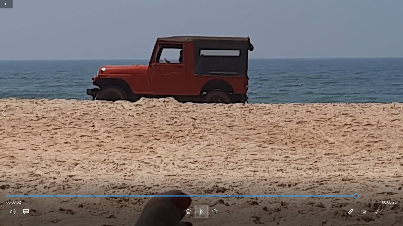 Arossim Beach Goa one morning: tourists and other passersby