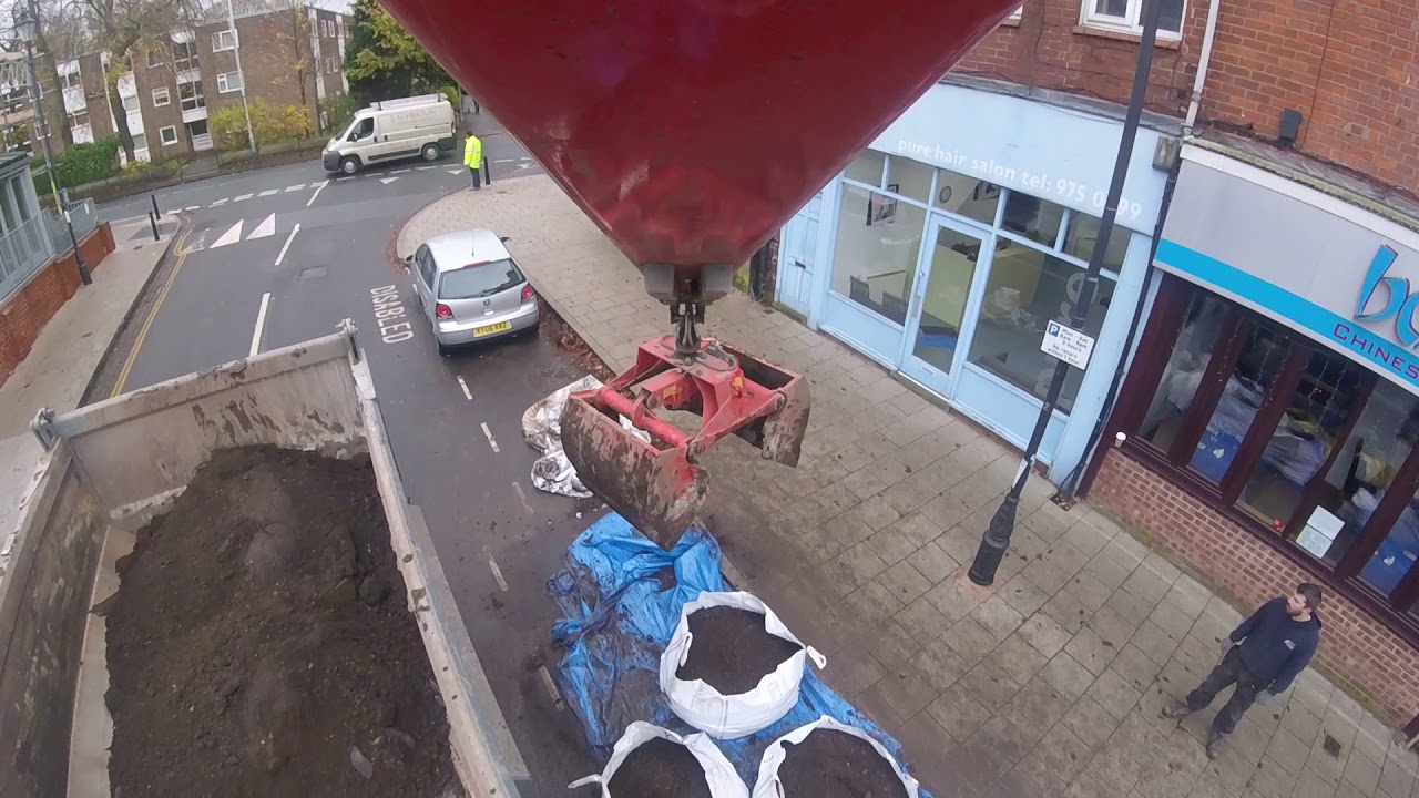 Loading ton bags with a Grab