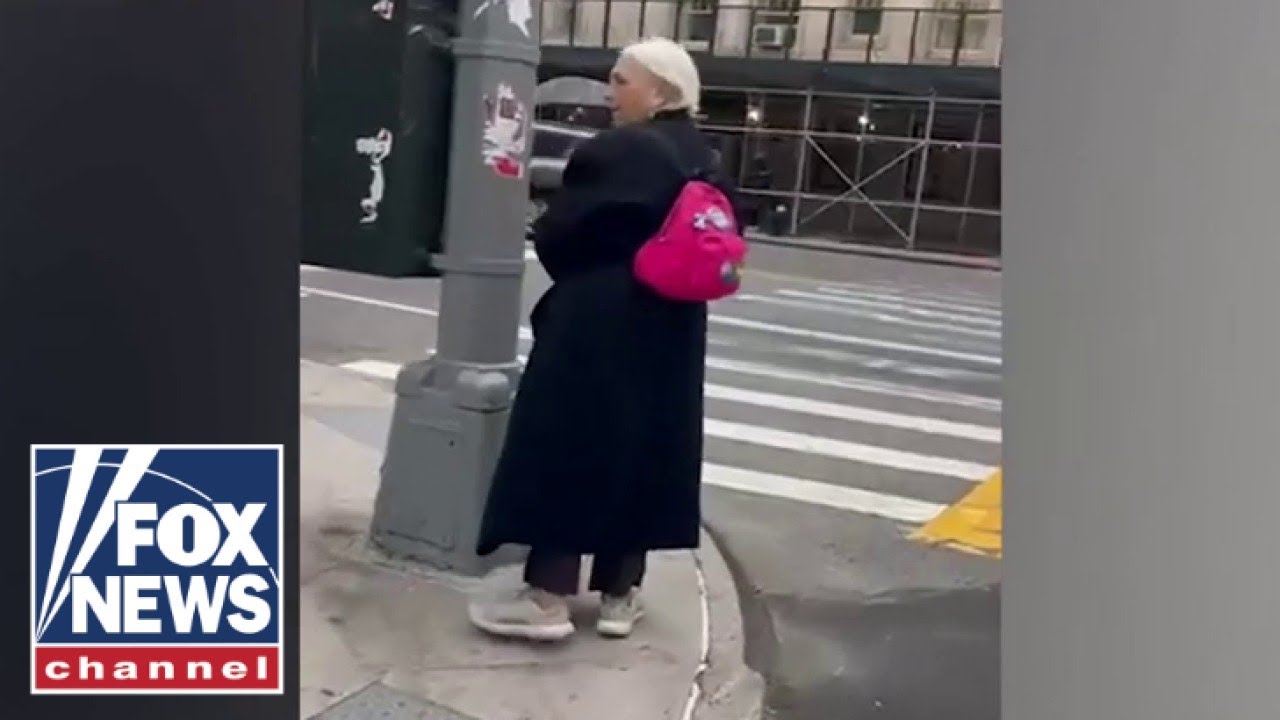 WATCH: Jewish student confronts woman ripping down hostage posters