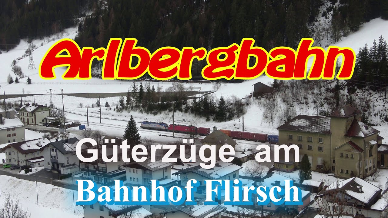 Arlbergbahn - Güterzüge am Bahnhof Flirsch. Taurus Sparda Bank, Baureihe 1144 als Schiebelok