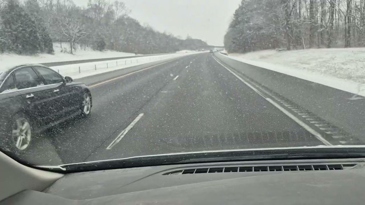 It's snowing on Interstate 40 near Advance, NC.
