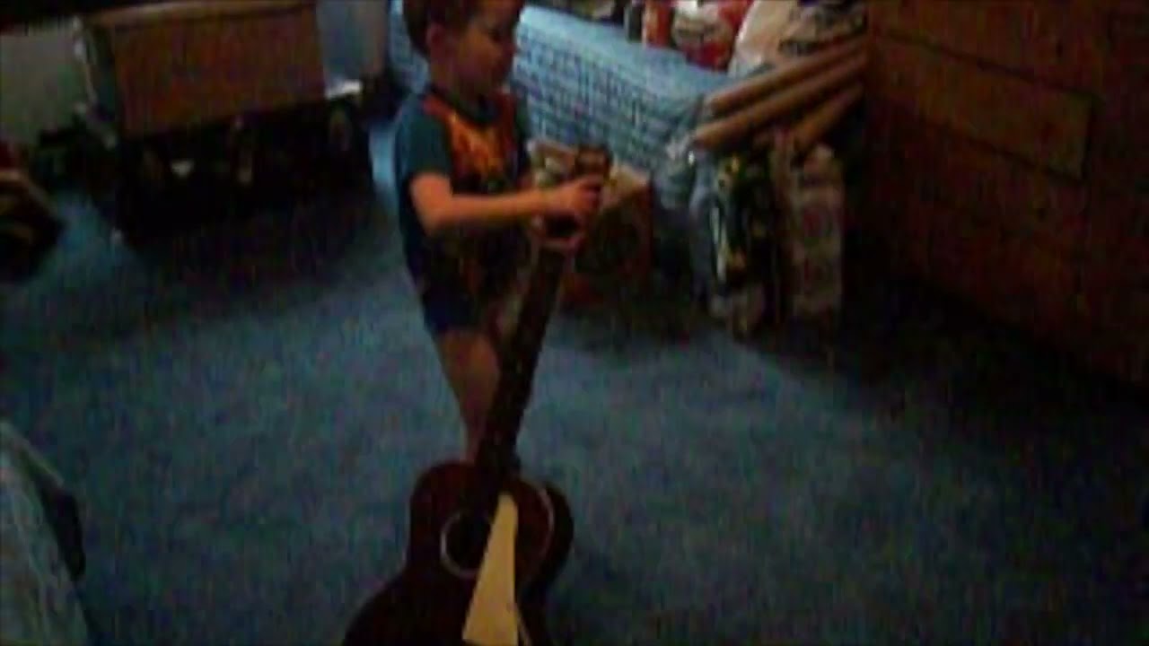 Strumming a Guitar part 3