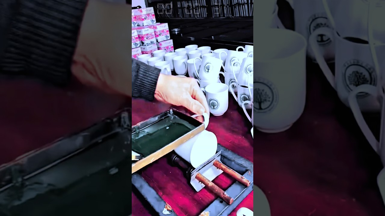 Tool for screen printing work on custom ceramic mugs with manual press