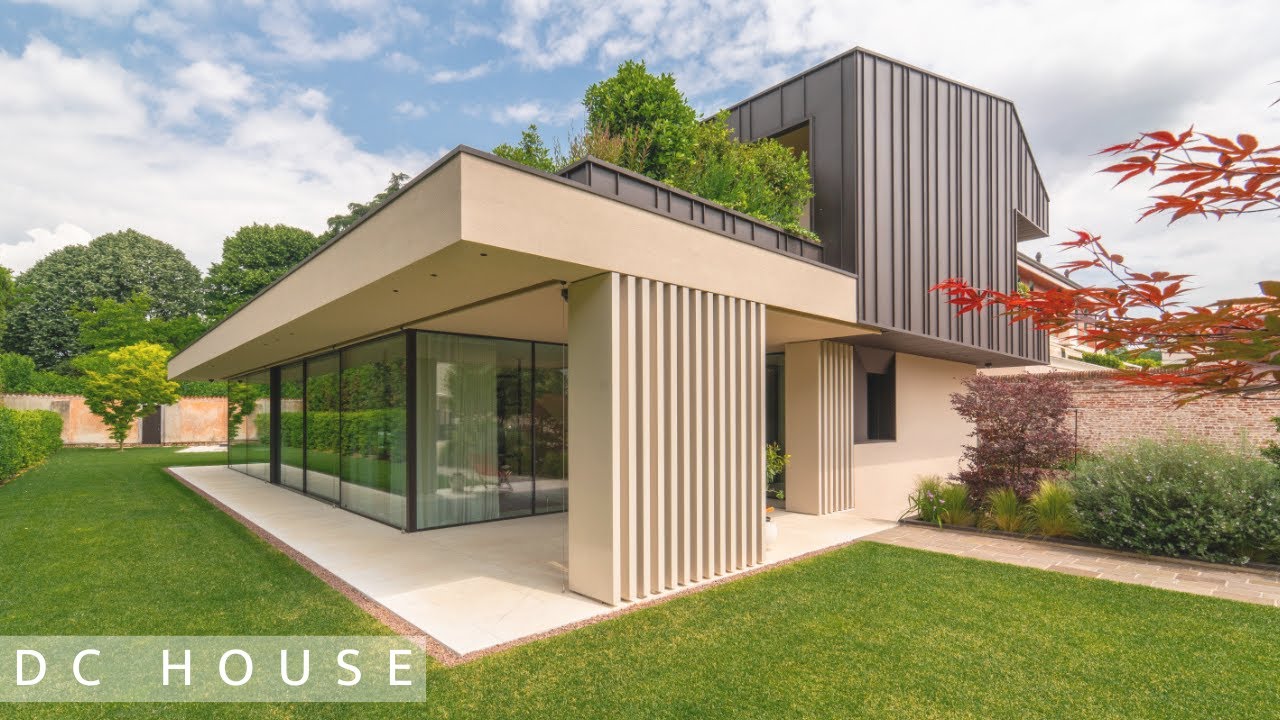 DC House: il sottile equilibrio fra trasparenze,volumi e matericità