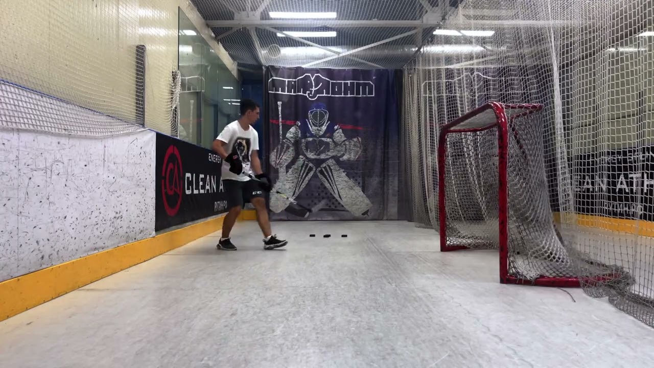 87- Close-range backhand shot after puck retrieval