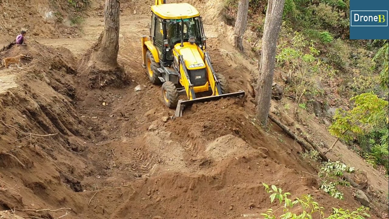 Loose Soil-JCB Backhoe Loader-Hilly New Rough Road Construction