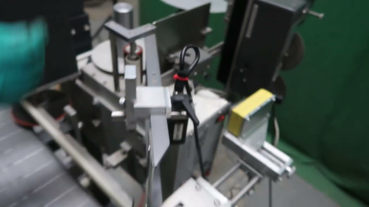 Universal Automatic Pressure Sensitive Labeling Machine, Portable | Wohl Associates