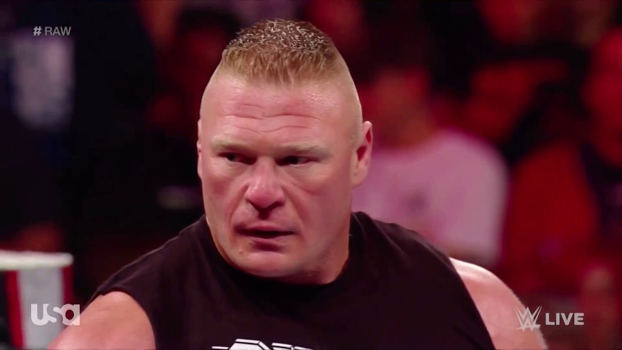 Brock Lesnar destroys Rey Mysterio and his son Dominick