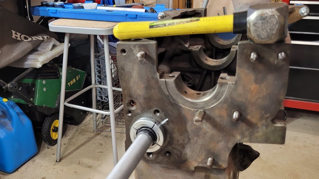 Willys Jeep 4-134 Go Devil CJ2A engine. Installing cam bearing with installation tool.