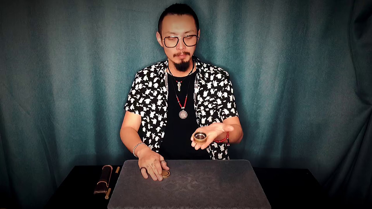 Okito coin box magic