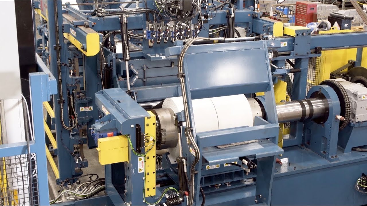 Automated Slitter Running Gutter Coils in Our Plant Before Shipping
