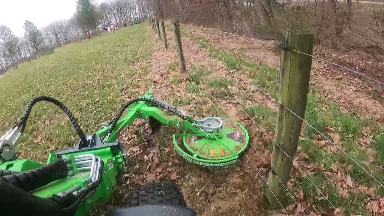 Avant Tecno Wheel loader with Fence Mower in action. This thing is awesome at trimming!