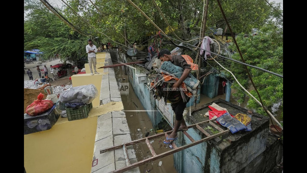 Powerful floods devastate northern India as experts say climate change bringing 'intensifying' rains
