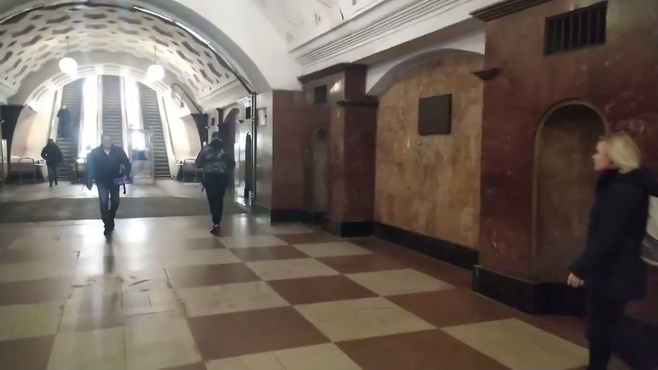 Metro station Krasnye Vorota, Moscow, Red Line - interior view, arrival and departure of the train