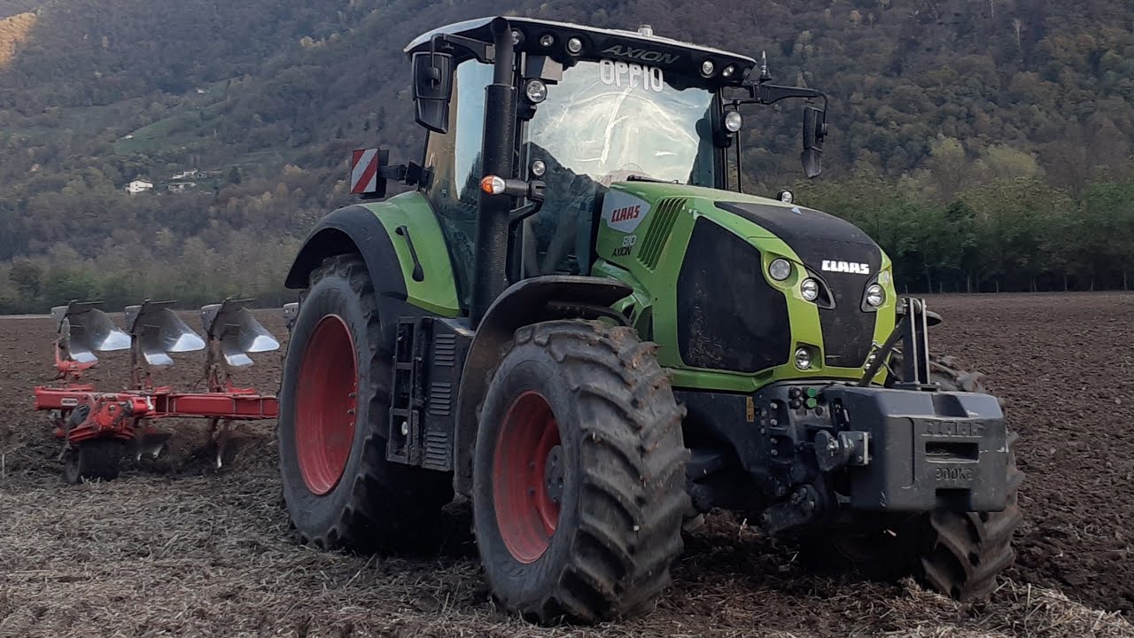 CLAAS AXION 810 + ARATRO PENTAVOMERE ENTROSOLCO MASCHIO